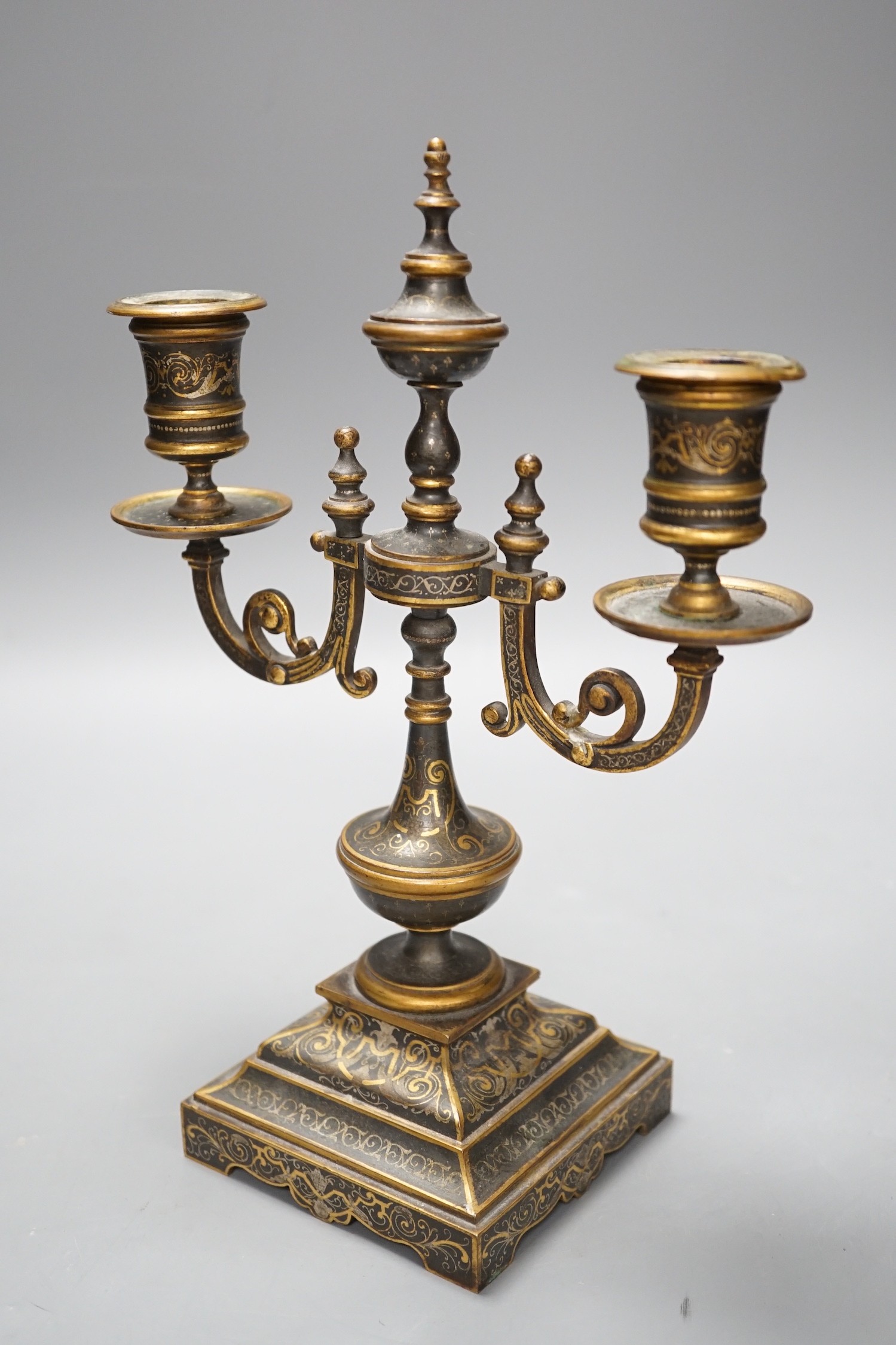 A French two branch niello work candelabrum, 16.5cms high